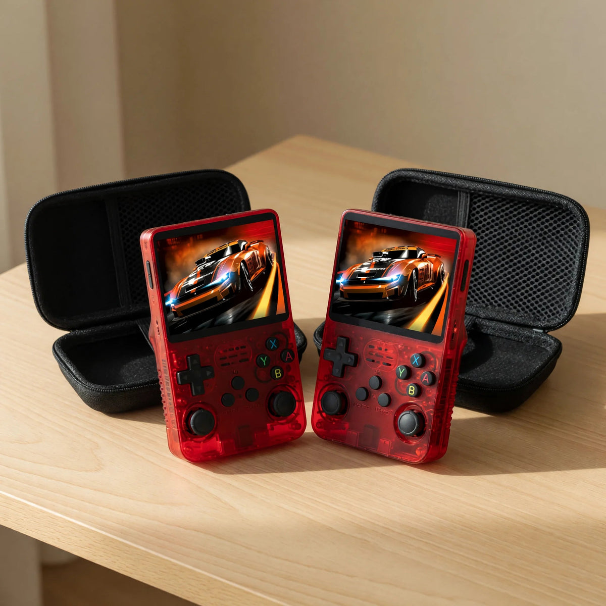 Duo Pocketro One coloris rouge translucide : deux consoles avec leurs housses de protection